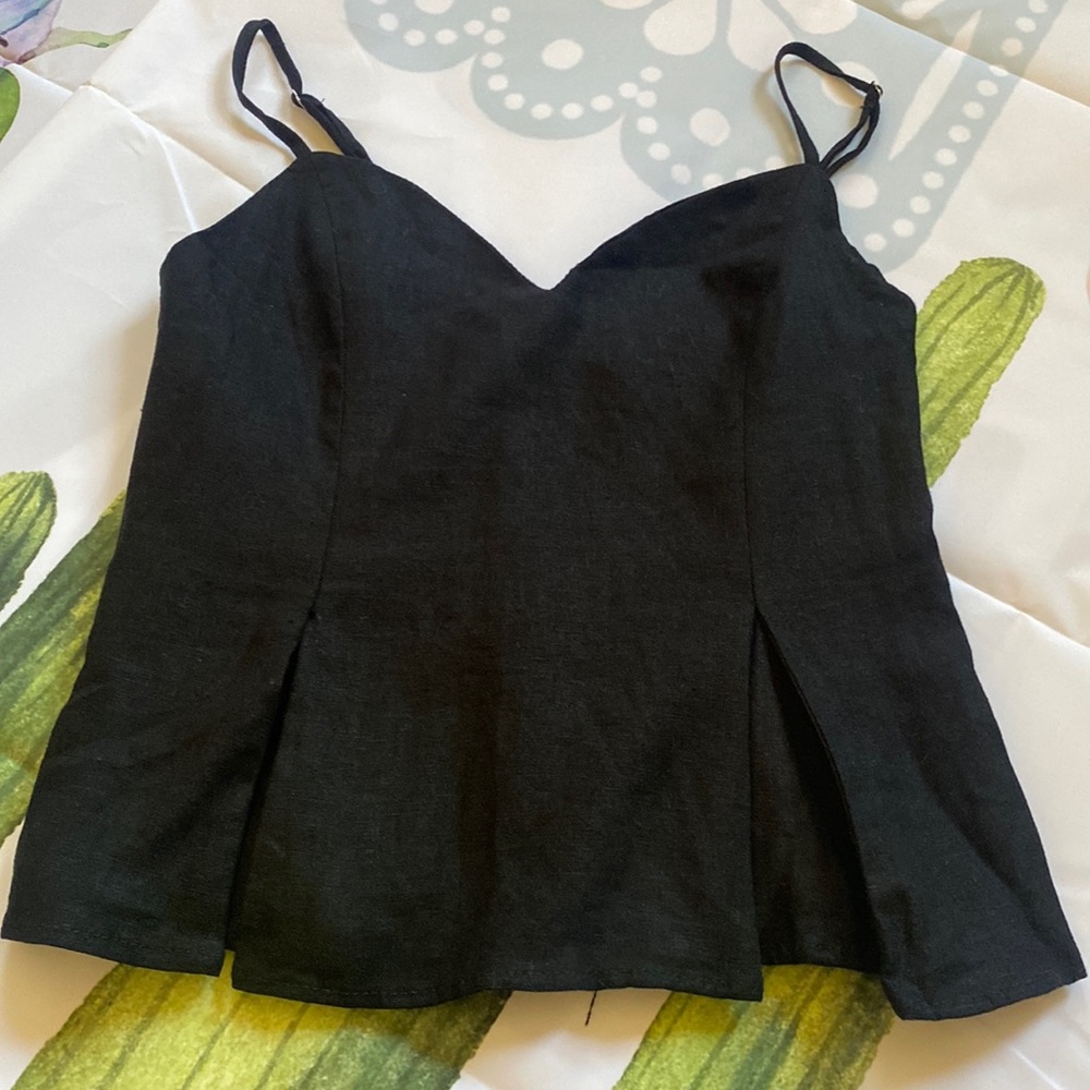 Zara’s black top  with adjustable straps